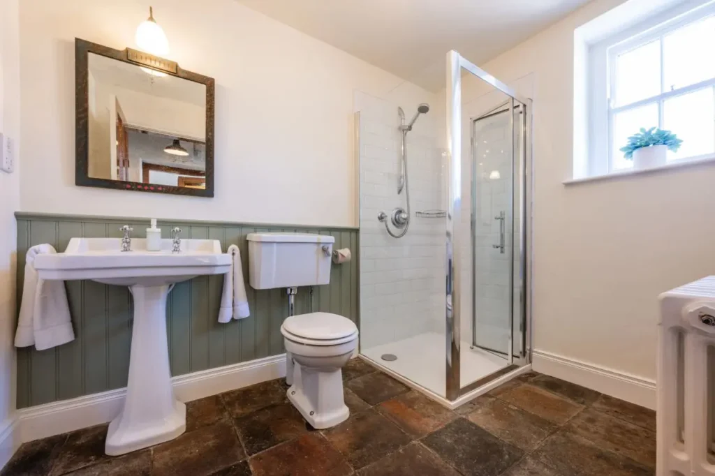 Vintage bathroom with walk-in shower and sink